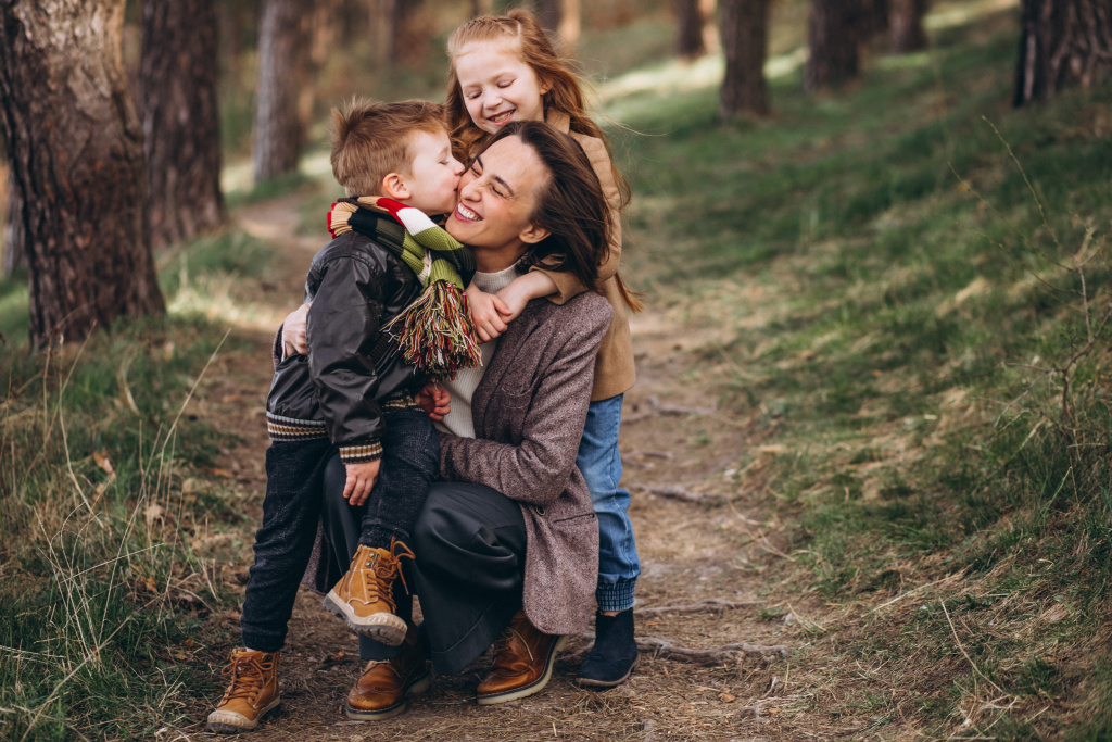 young-mother-with-daughter-son-forest.jpg